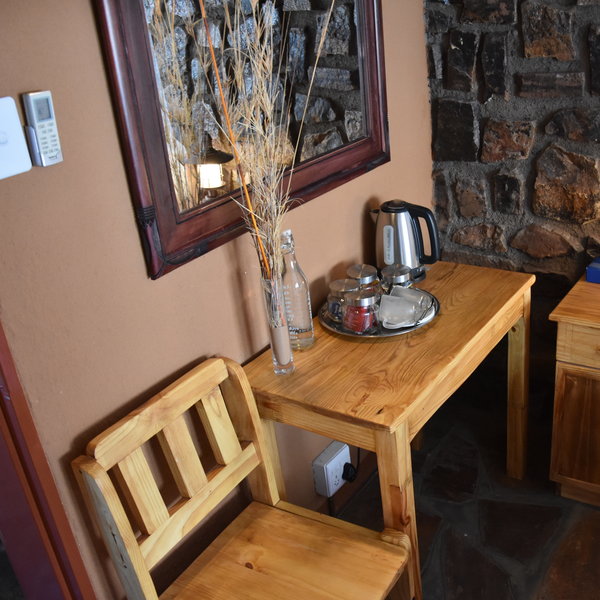 ...a small desk and luggage rack...