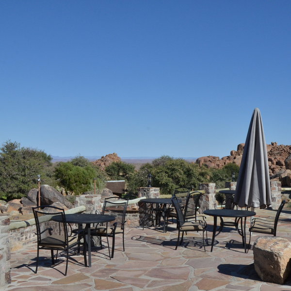 Outside there is a large terrace with more dining tables...