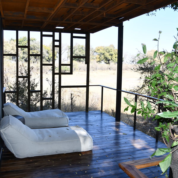 The spacious deck has a couple of cushion loungers from which to enjoy the scenery.