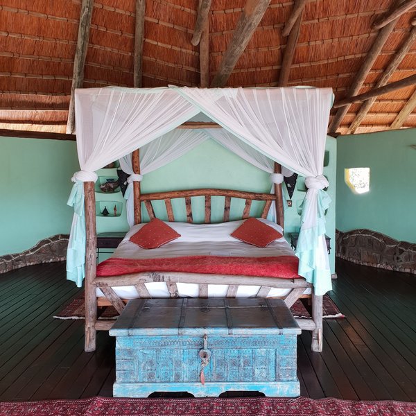 All of the cottages have king size four poster beds...