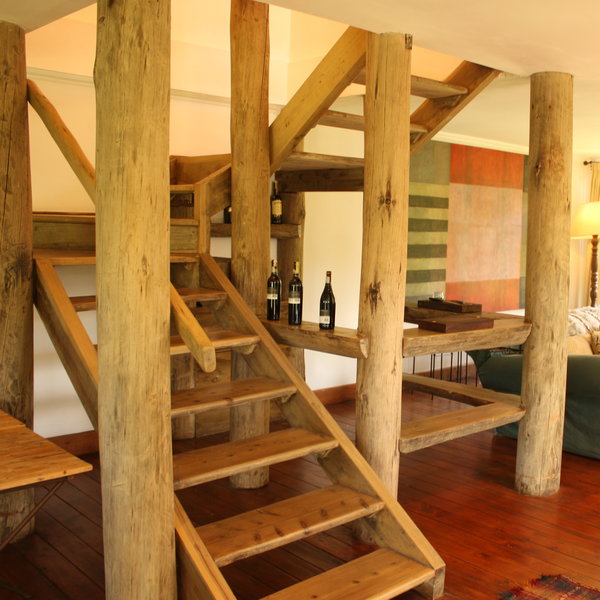 Stairs lead from here up to the two studio rooms...