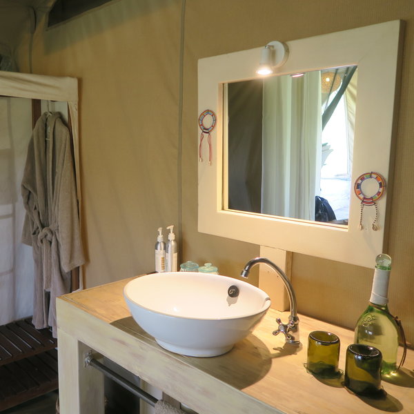 Considering your room is a tent, the bathroom is surprisingly stylish...