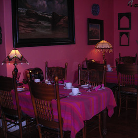 Inside there is an ornate dining room...