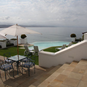 ...a pool with a romantic sea view...