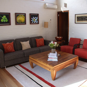 ...and a spacious lounge area, decorated with natural textures and colours.