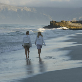 ...or taking walks along the white sandy beach.