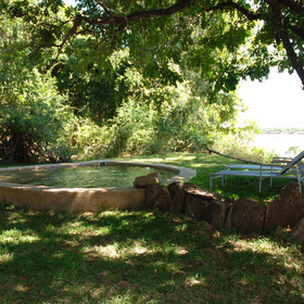A small pool is located at the front of the house, also complete with river view.