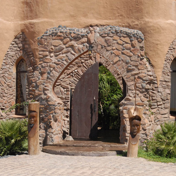 With its teracotta walls and arches...
